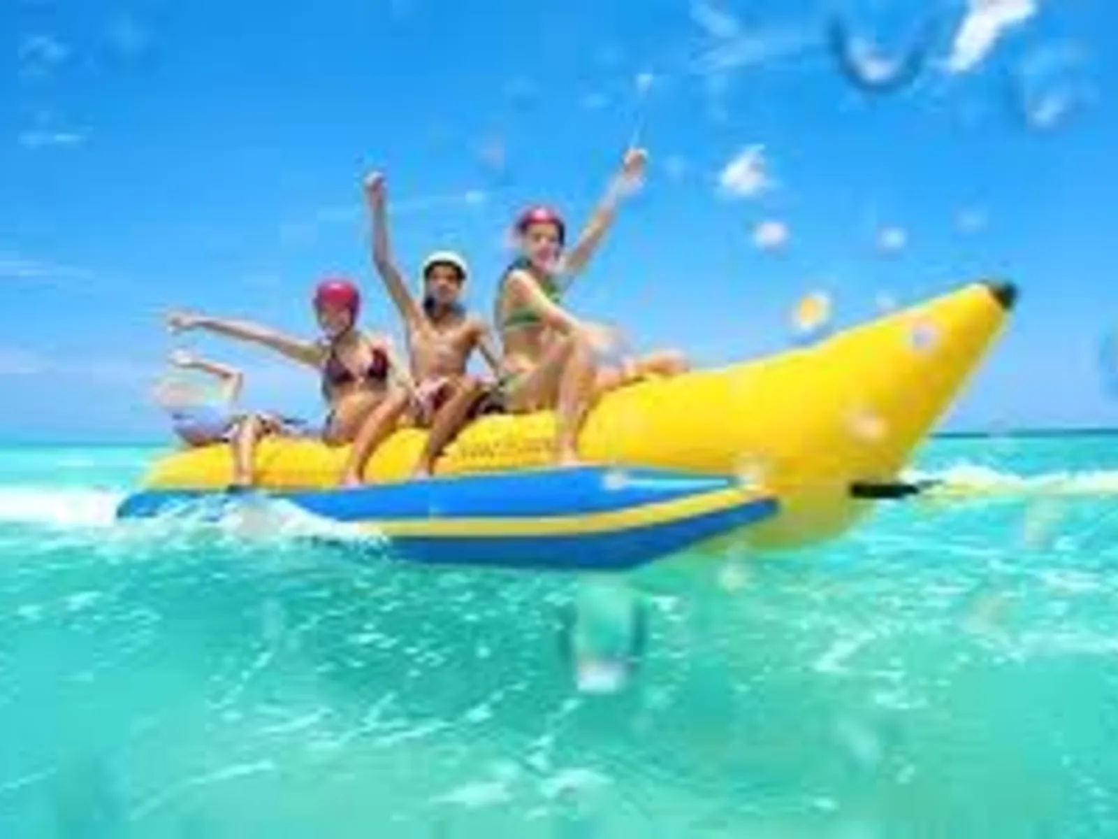 Banana ride beside a yacht in Dubai