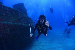 Man posing for photo while Scuba Diving
